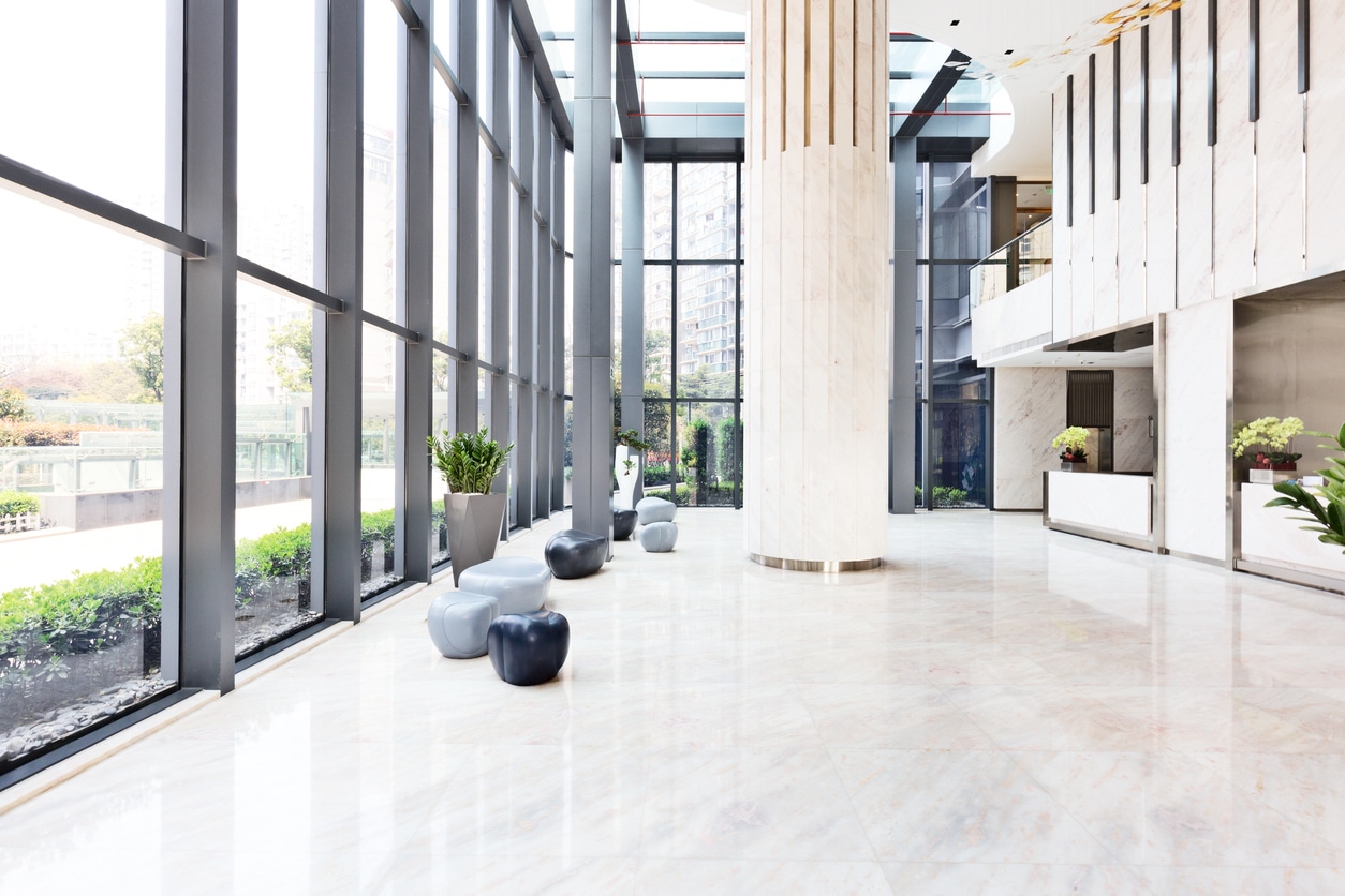 elegant stools and talbe in huge and bright hall